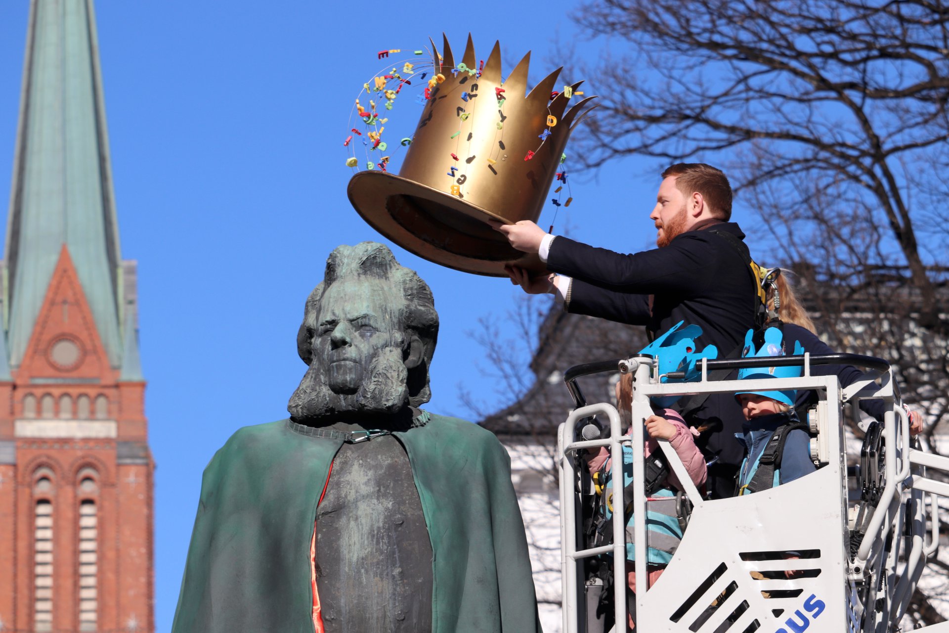Mayor Marius Roheim Aarvold crowns Ibsen during the annual celebration of his birthday in the ski resort.